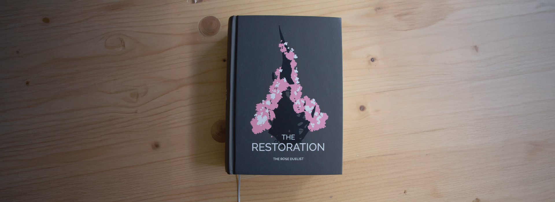 A shot of The Restoration book.