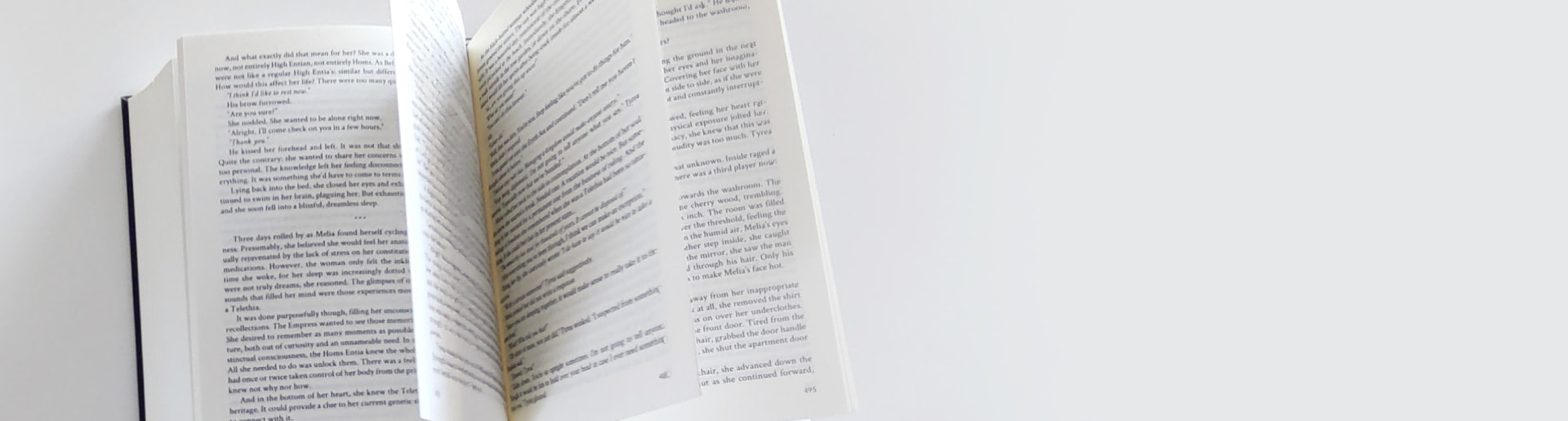 The book pages mid-flip.