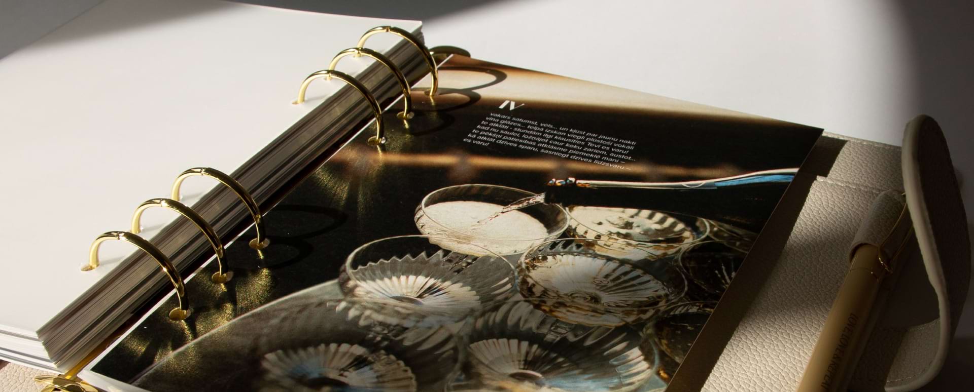 A close up of one of the inspirational pages featuring a poem and photograph from a table in a wedding.