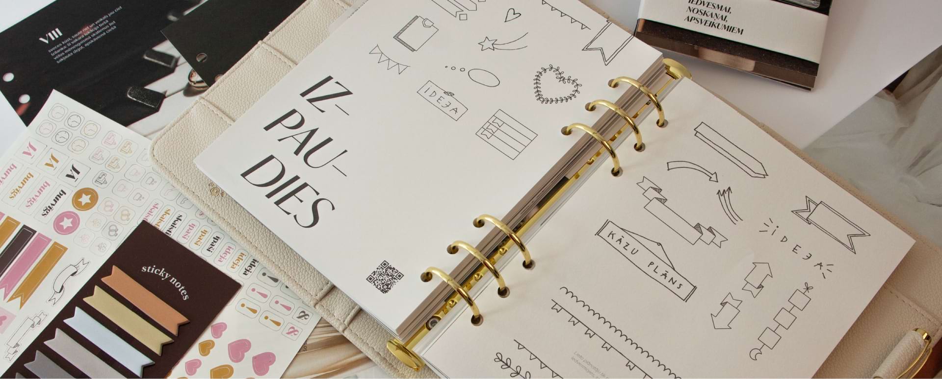 The wedding planner surrounded by different stationery additions.