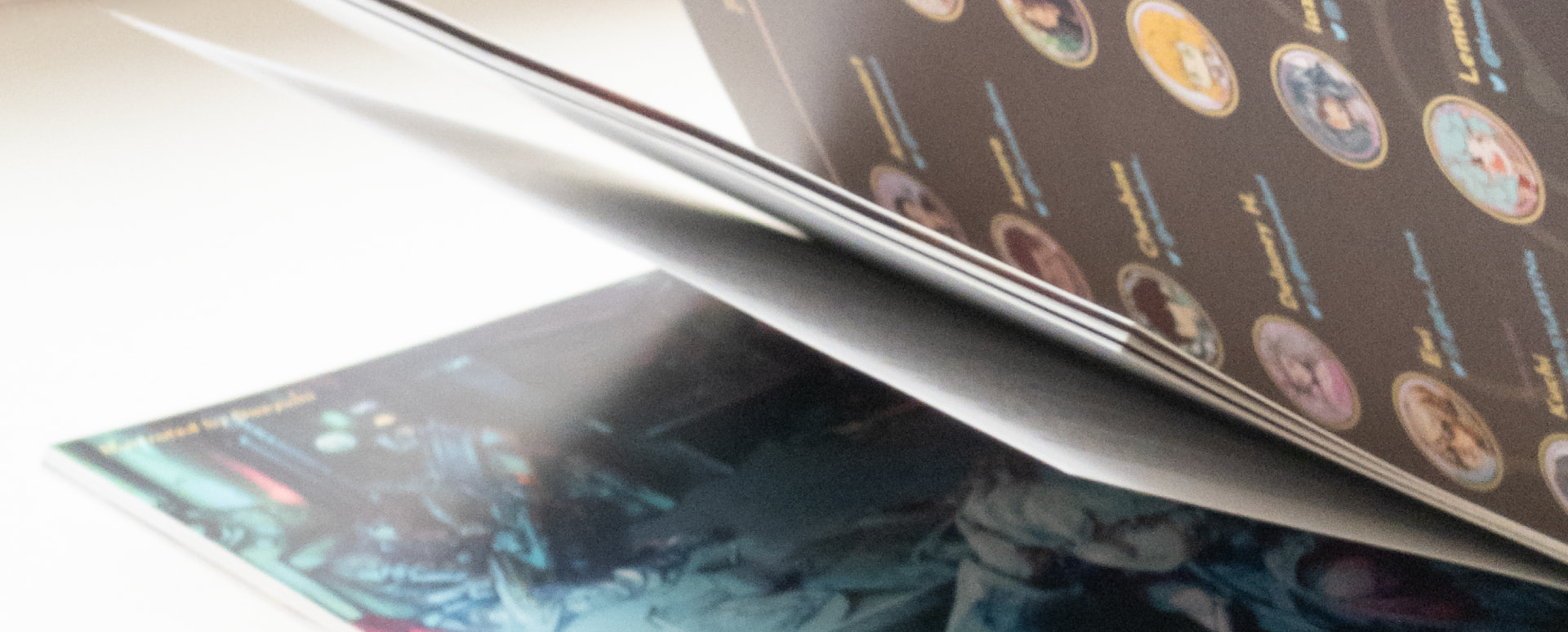 A close up of the zine mid page flip.